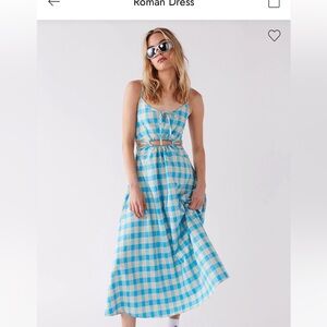 This is a brand new untouched Ghanda dress. This dress is a size small.